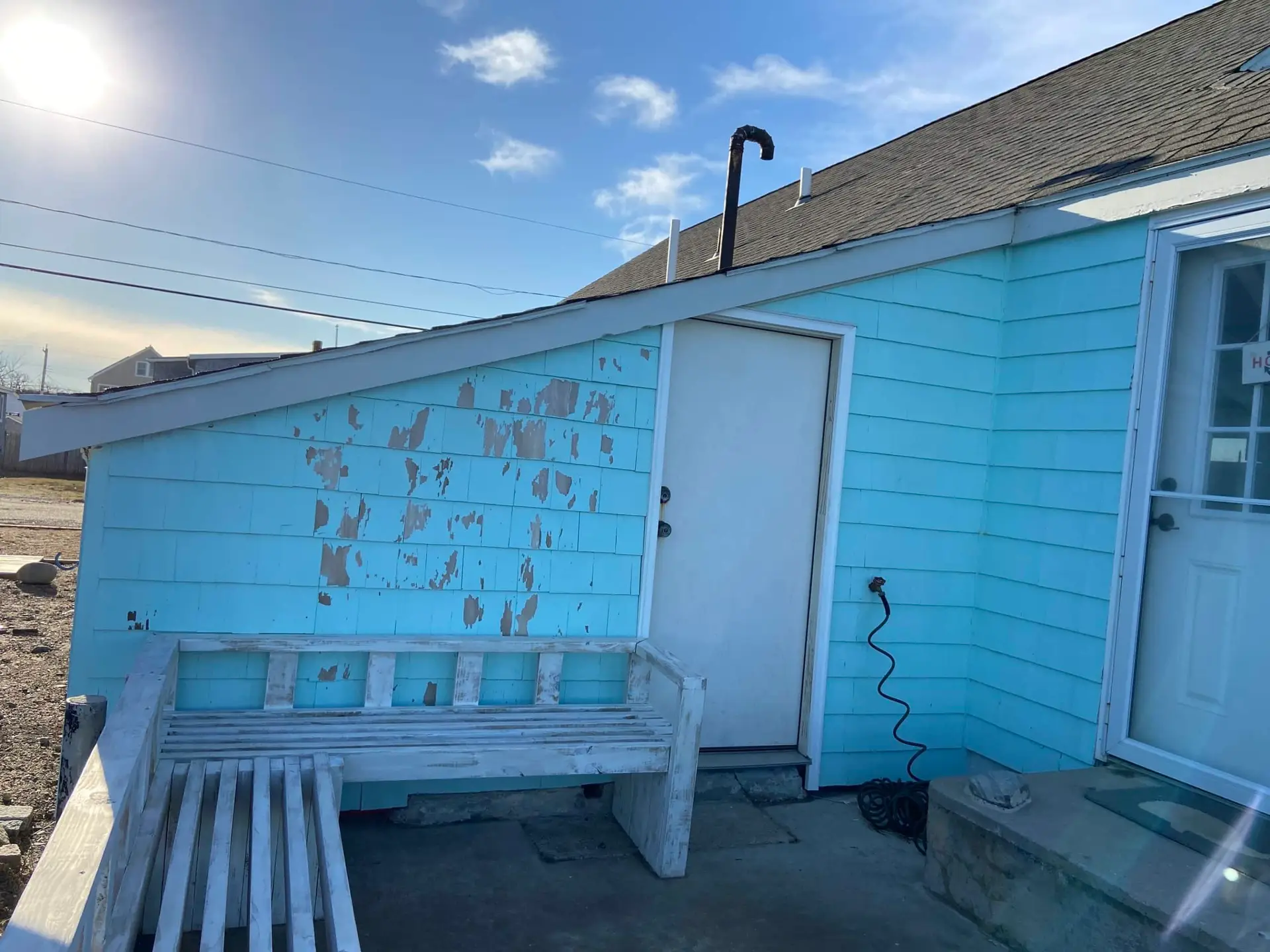 white and blue siding on a house