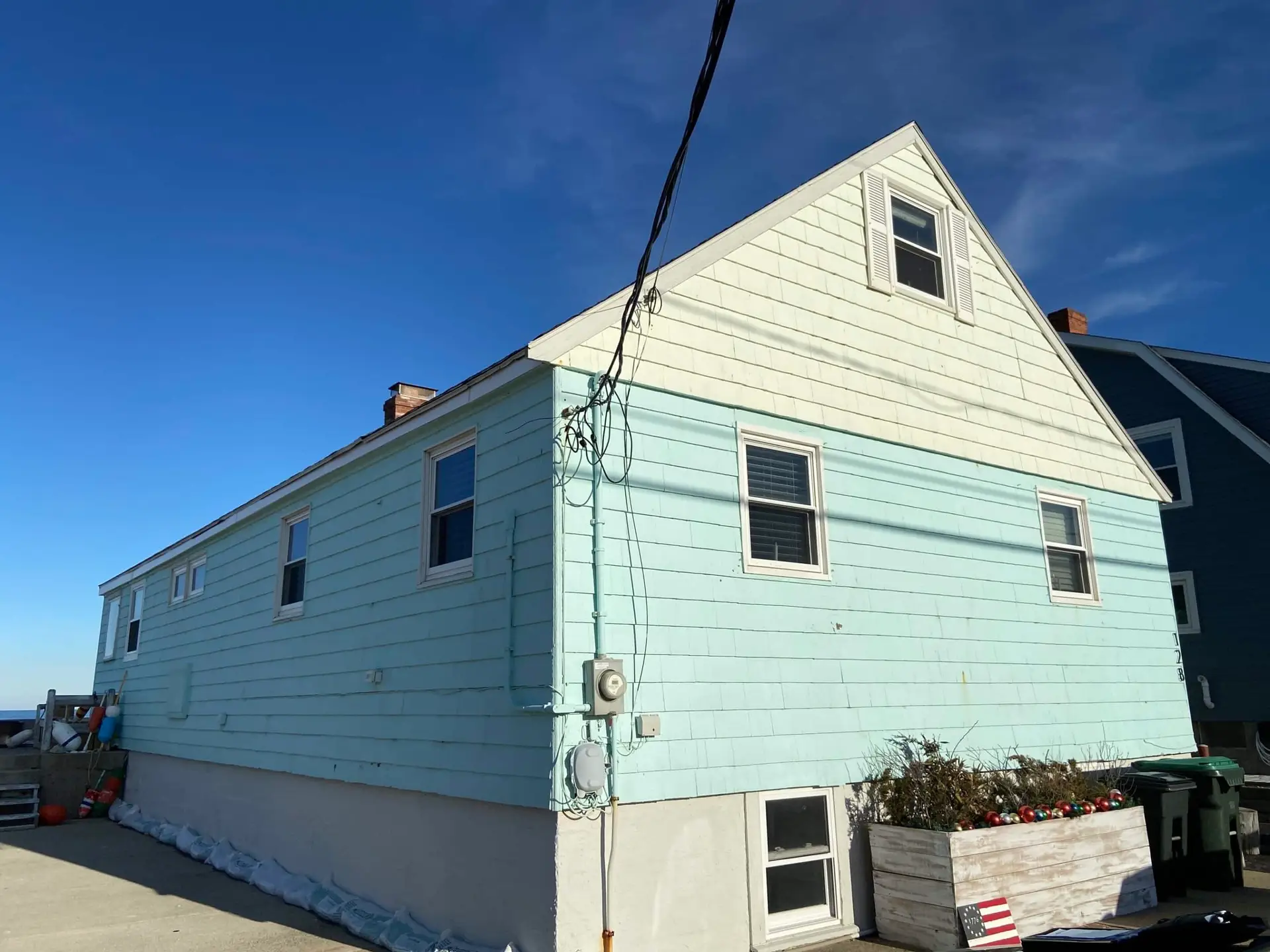 white and blue siding on a house