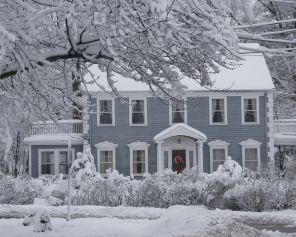 roofing faq - image showing snow on roof