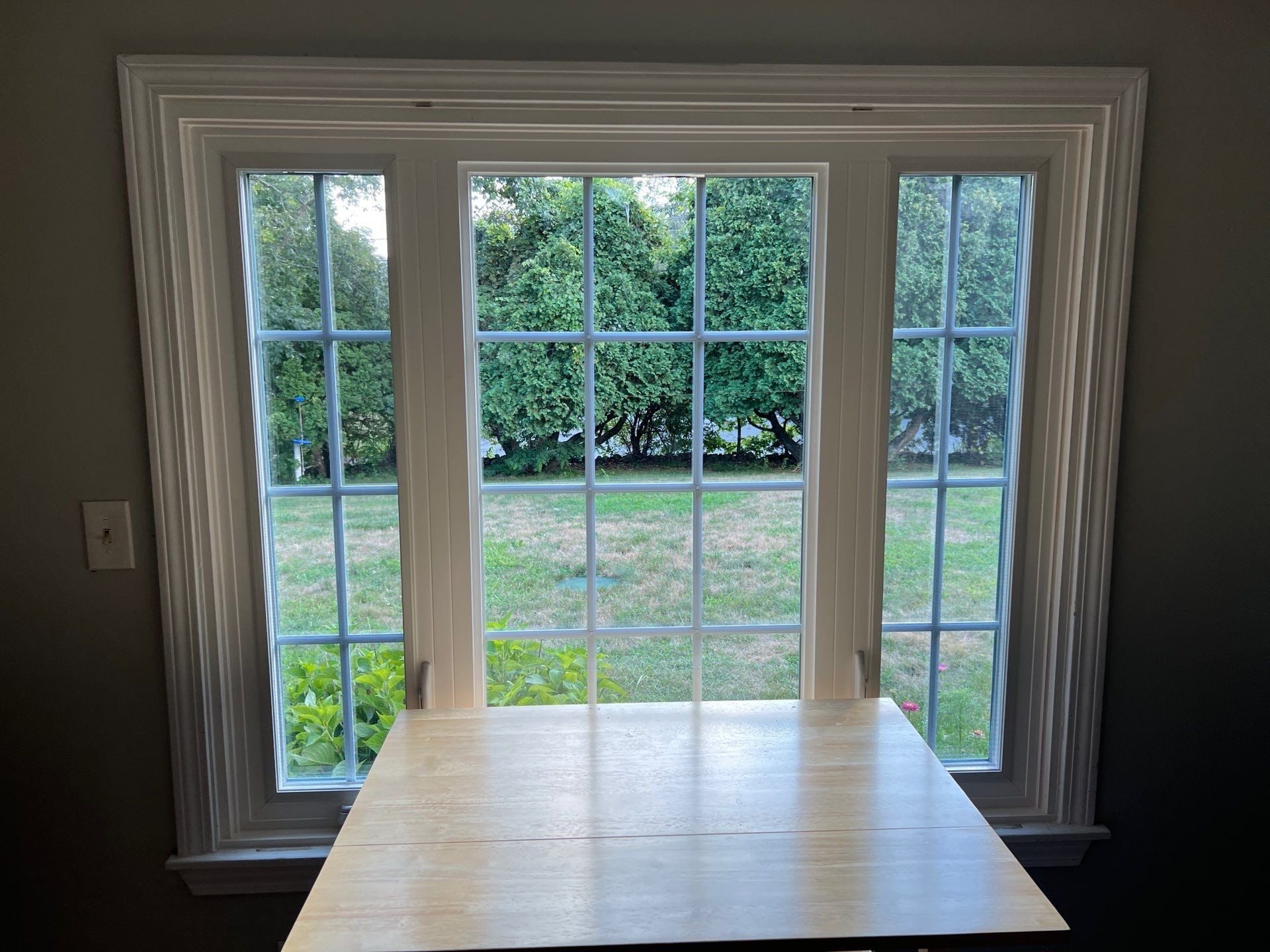 Visible moisture and haze inside insulated glass are signs of condensation on windows caused by seal failure. Professional window replacement restores clarity, improves insulation, and helps eliminate recurring condensation problems.