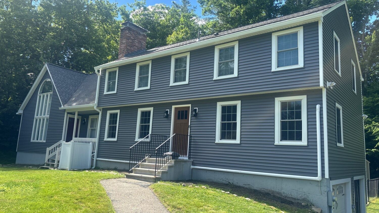 Vinyl siding installation featured in a home maintenance checklist for protecting the home from moisture while maintaining curb appeal.