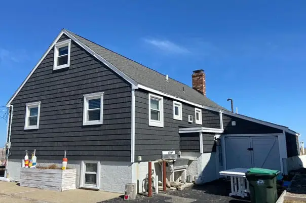 Expert vinyl siding installation in Nashua, NH by Coastal Windows & Exteriors—featuring energy-efficient foam-backed panels, fade-resistant durability, and enhanced curb appeal paired with lifetime warranty protection.