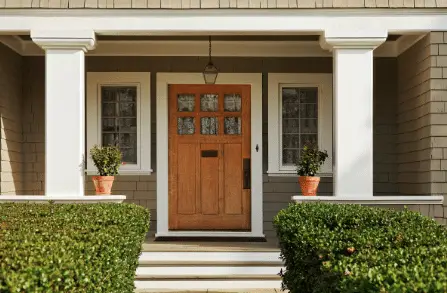 Weathered‑wood siding replaced with maintenance‑free vinyl on a charming New England home