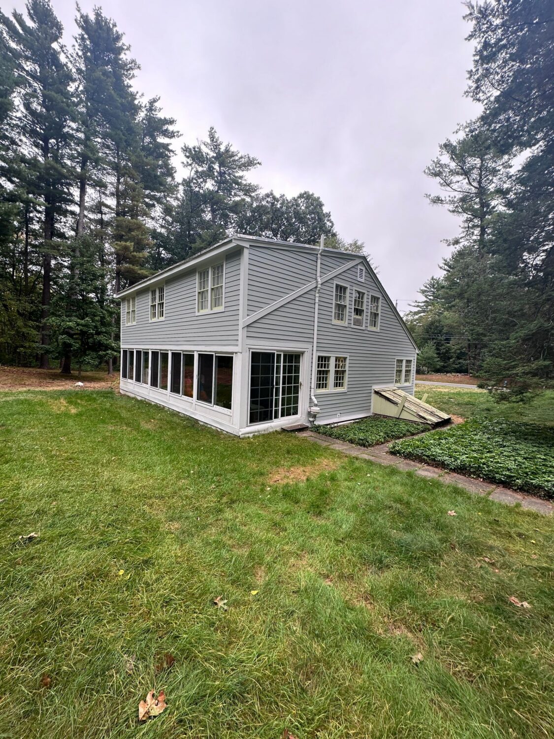 Light Mist James Hardie siding brightens this home's exterior while maintaining a clean and classic appearance. Many homeowners researching James Hardie siding colors choose lighter shades to create an airy, modern aesthetic.