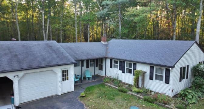 Aerial view of a single-story house in Wells, ME