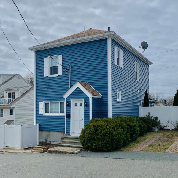 New vinyl siding installed in Beverly MA, Essex County, by Coastal Windows & Exteriors to refresh curb appeal, increase energy efficiency, and reduce home maintenance