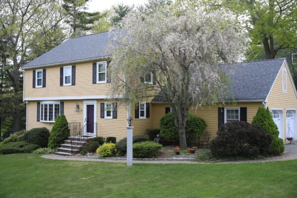 Vinyl replacement windows installed in Beverly MA home to improve insulation, reduce noise, and enhance year‑round comfort