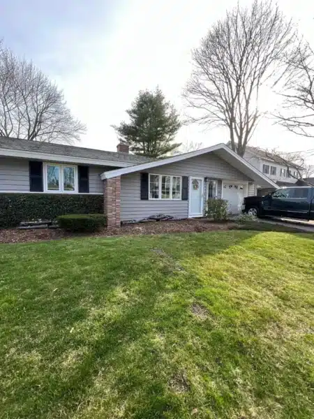 Vinyl siding and window installation in Danvers MA, Essex County, by Coastal Windows & Exteriors for an energy-efficient and low-maintenance exterior transformation