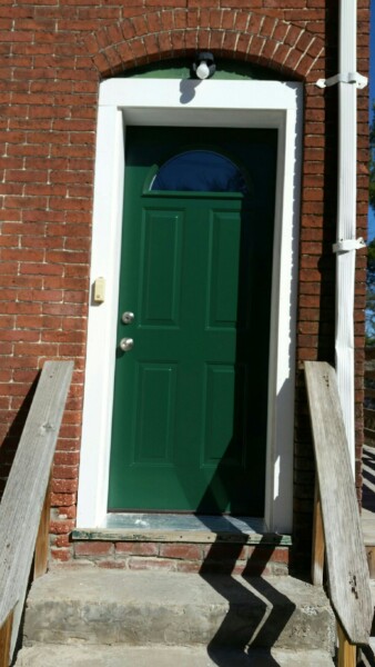 Energy-efficient replacement back doors installed in Fitchburg MA to eliminate drafts and improve security and insulation