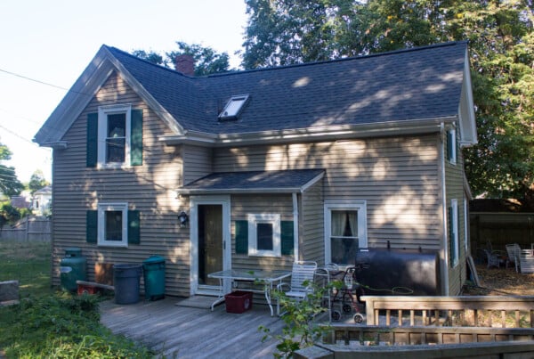 GAF roofing system installed on a Gloucester MA home to replace aging shingles and prevent moss-related leaks