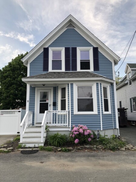 Vinyl siding installation in Gloucester MA, North Shore, featuring a full exterior upgrade by Coastal Windows & Exteriors