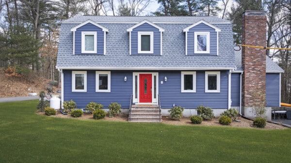 Indigo Blue vinyl siding installation in Norfolk MA, Norfolk County, by Coastal Windows & Exteriors for a low-maintenance and visually striking exterior upgrade