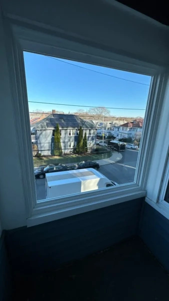 Full home exterior remodel in Roslindale MA, Greater Boston, featuring new siding, windows, and roofing by Coastal Windows & Exteriors