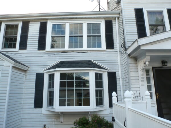 New bay window and double-hung window installation in Salem MA to improve energy efficiency, natural light, and ventilation
