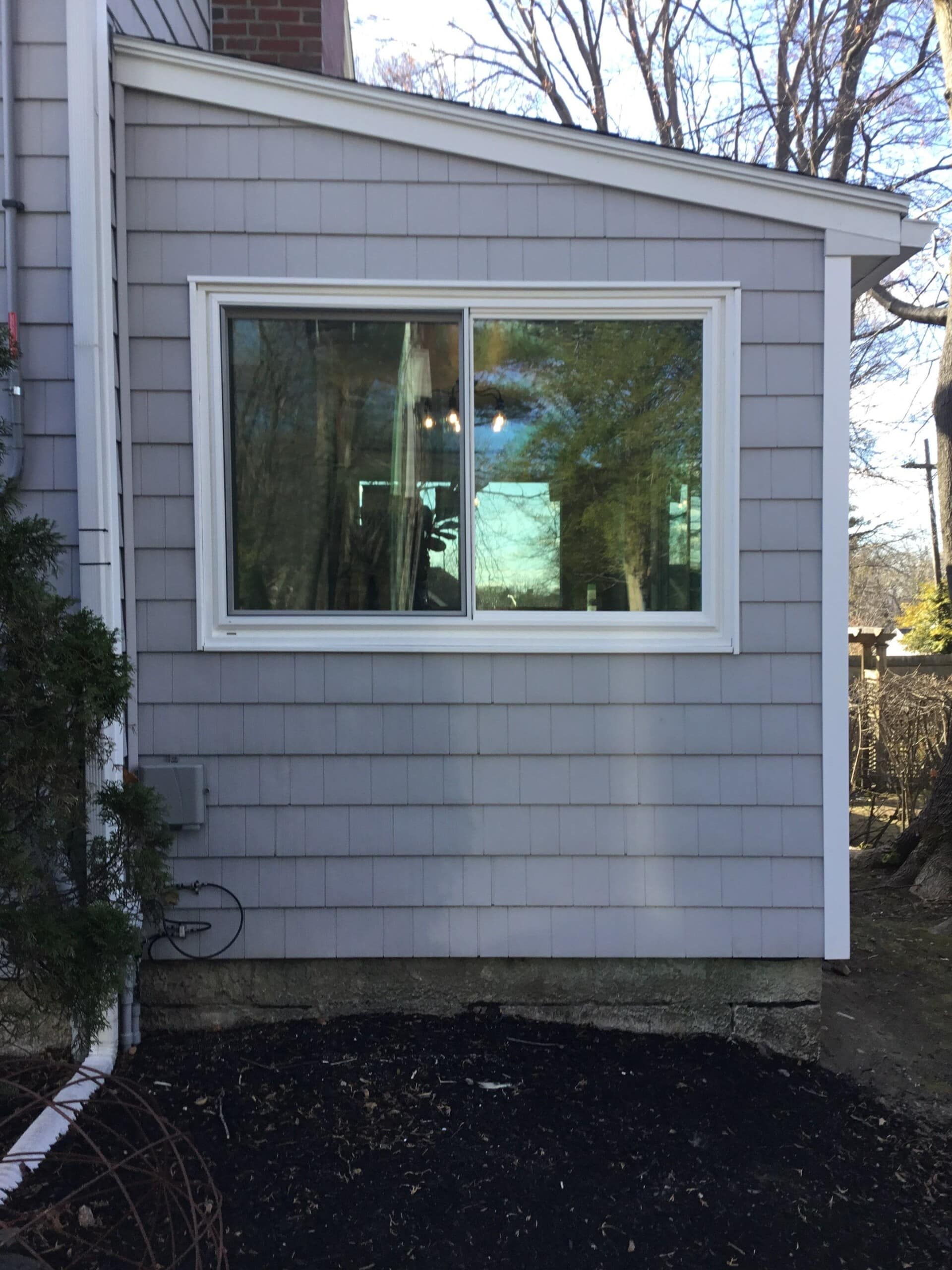 Vinyl window installation in Nahant MA, North Shore, Essex County, with energy-efficient Vytex double-hung windows by Coastal Windows & Exteriors