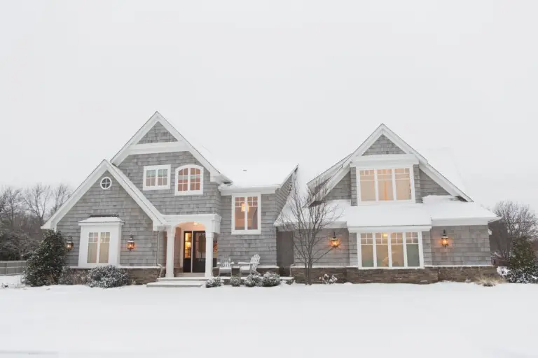 roof covered in snow and the impact of ice dams