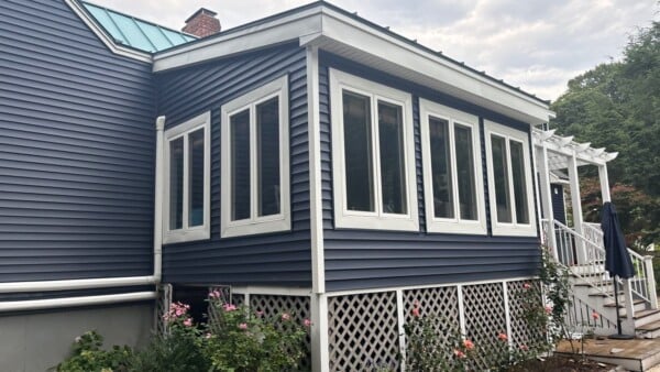 Vinyl siding installation in Georgetown MA, North Shore, Essex County, featuring durable exterior renovation by Coastal Windows & Exteriors