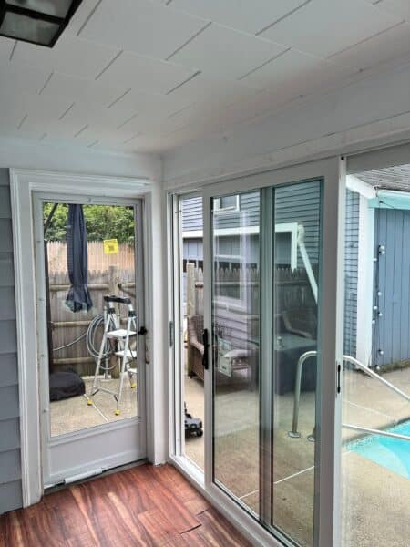 Sliding patio door installation in Lynn MA, North Shore, Essex County, featuring energy-efficient glass doors for improved indoor-outdoor living and natural light.