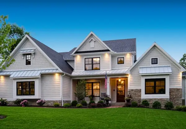 Home with new white siding from Coastal Windows & Exteriors