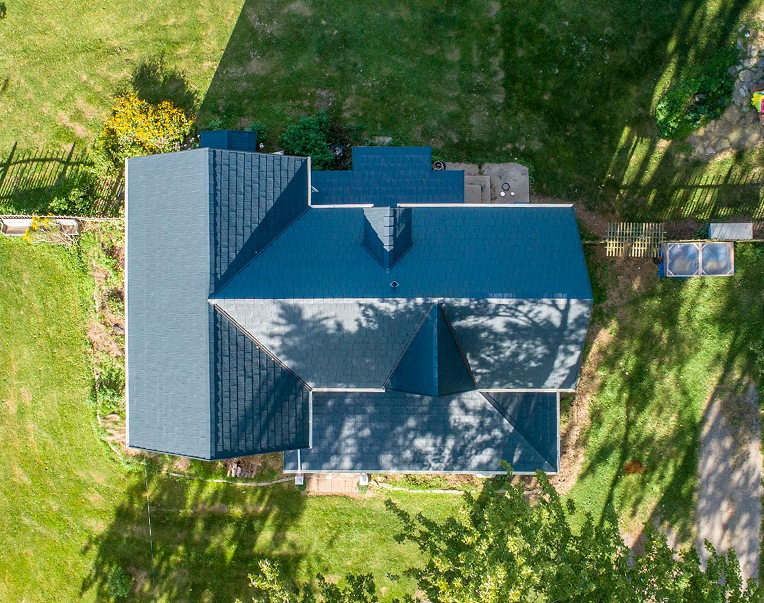 over the home view of the metal roofing contractor project