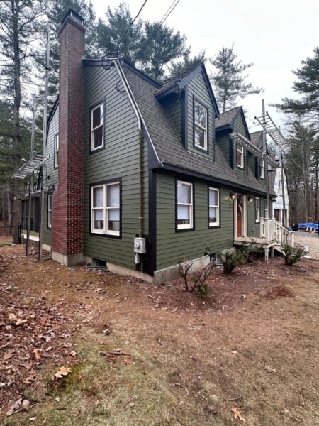 James Hardie siding installation in Rowley MA, North Shore, Essex County, featuring Monterey Taupe HardiePlank by Coastal Windows & Exteriors.