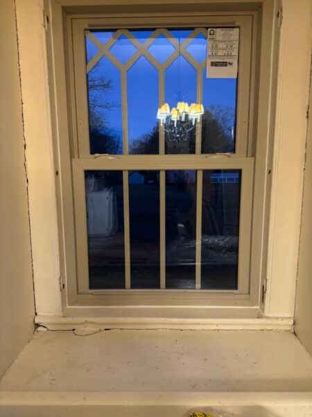 Vinyl replacement window installation in Rye NH, Seacoast Region, Rockingham County, featuring energy-efficient double-pane windows for coastal durability and curb appeal.