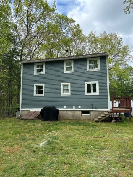 James Hardie shake siding installation in Tewksbury MA, Merrimack Valley, Middlesex County, by Coastal Windows & Exteriors for a weather-resistant and stylish home upgrade