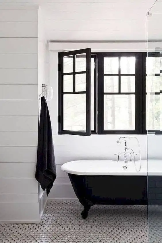 bathroom with black windows