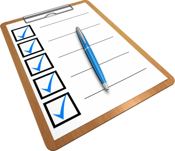 A clipboard holds a roof inspection checklist, featuring five items each marked with a blue check. A blue pen lies diagonally across the paper. The list sits on a wooden clipboard with a silver clip.