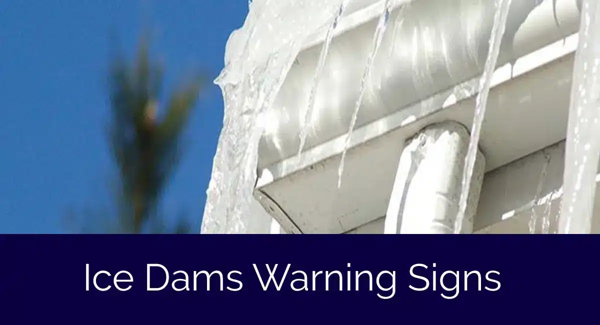Close-up of a house roof with icicles hanging from the edge, highlighting potential ice dam formation and roof damage. The bottom of the image features a dark blue band with the text Ice Dams Warning Signs.