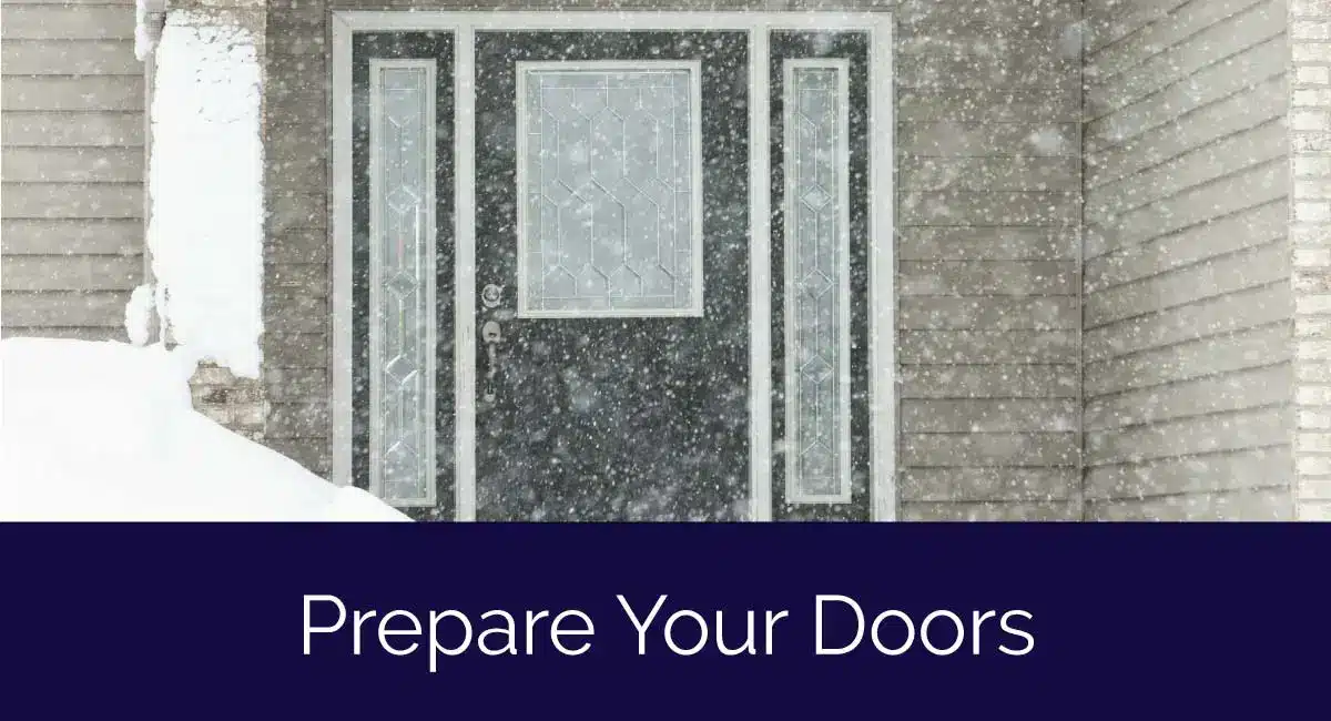 Snow falls in front of a closed, decorative front door of a house, with snow piled up on the ground. Text at the bottom reads, Prepare Your Doors with proper winter door preparation.