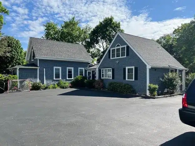 This roofing project in Beverly showcases popular shingle colors for roofs that enhance curb appeal and durability.
