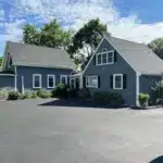 Popular shingle colors in New England including charcoal, pewter gray, ebony metal, and their compatibility with siding