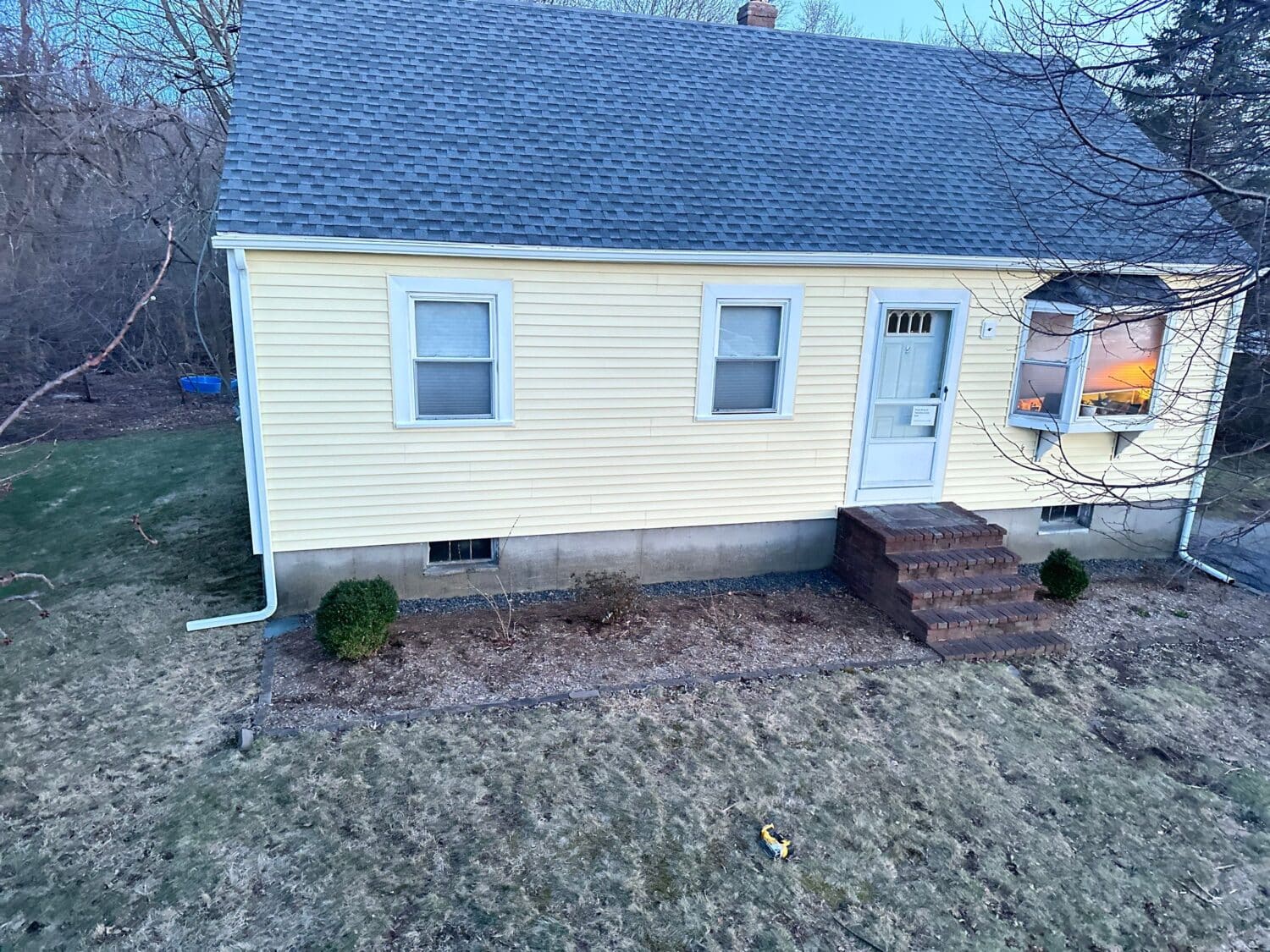 Vinyl siding installation by Coastal Windows & Exteriors in Massachusetts, showcasing durable, low-maintenance siding that enhances curb appeal and protects against New England weather.