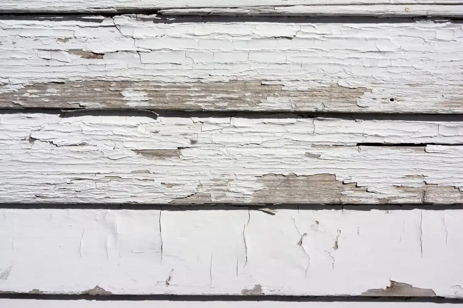 Rotting exterior siding identified during a siding inspection checklist before replacing damaged materials with durable new siding.