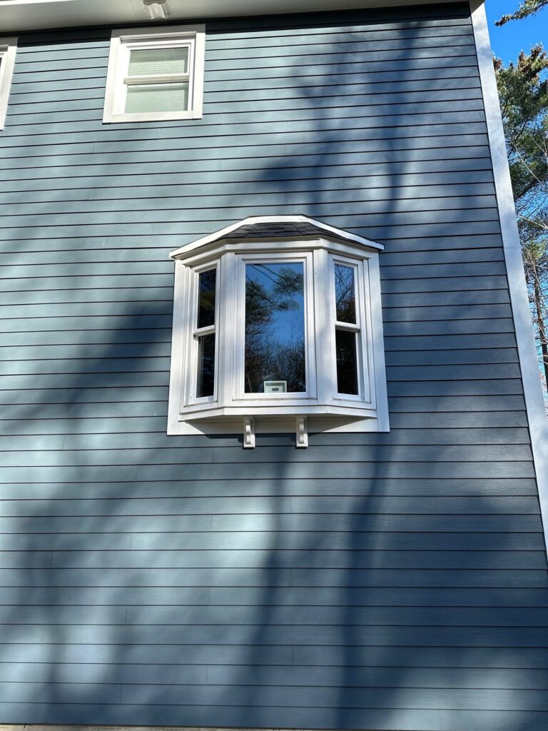 James Hardie Evening Blue upper level siding installation in Auburn NH