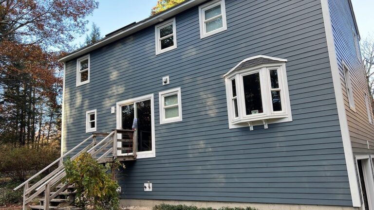 Complete home double-hung window replacement with black shutters in Auburn NH, Southern NH, Rockingham County by expert window installer