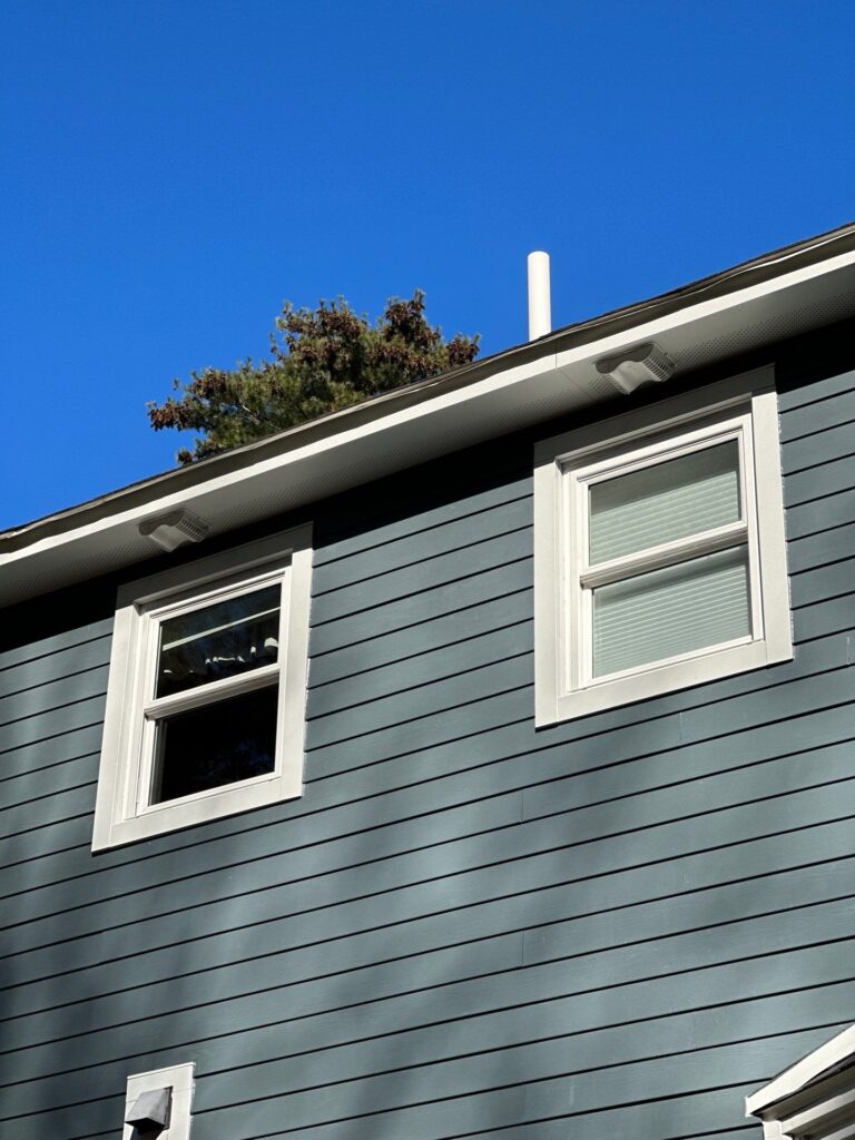 James Hardie Evening Blue fiber cement siding bay window detail in Auburn NH