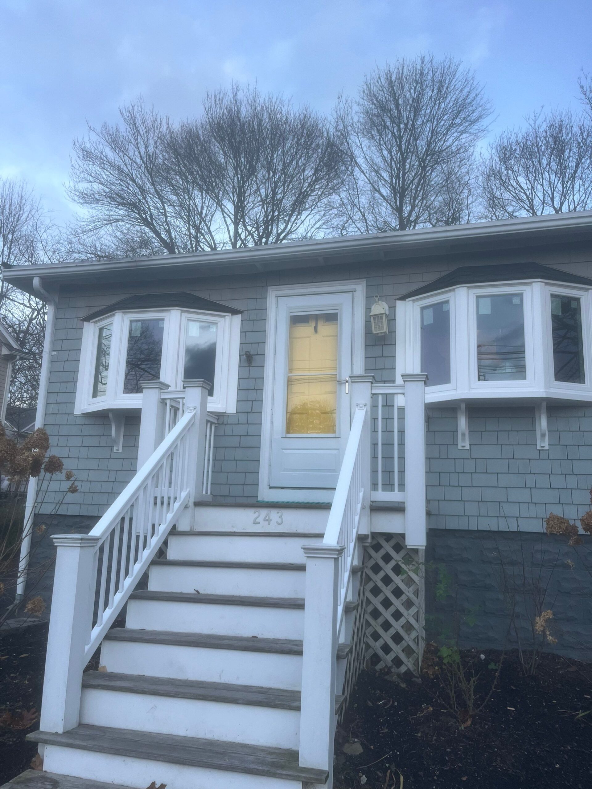 Best natural light windows replacement in Marblehead MA home exterior, Essex County, North Shore region during summer remodeling