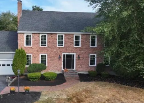 Two-story red brick house Window Installation in Rowley MA