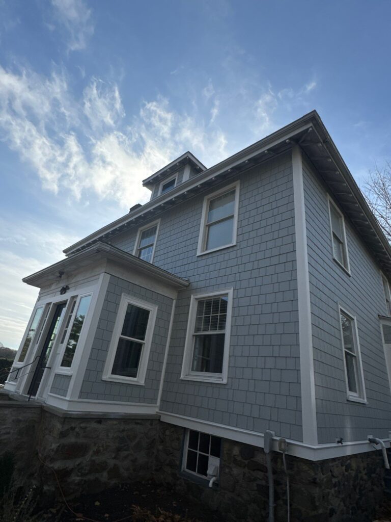 James Hardie siding installation Swampscott MA featuring Light Mist shake siding on seaside home