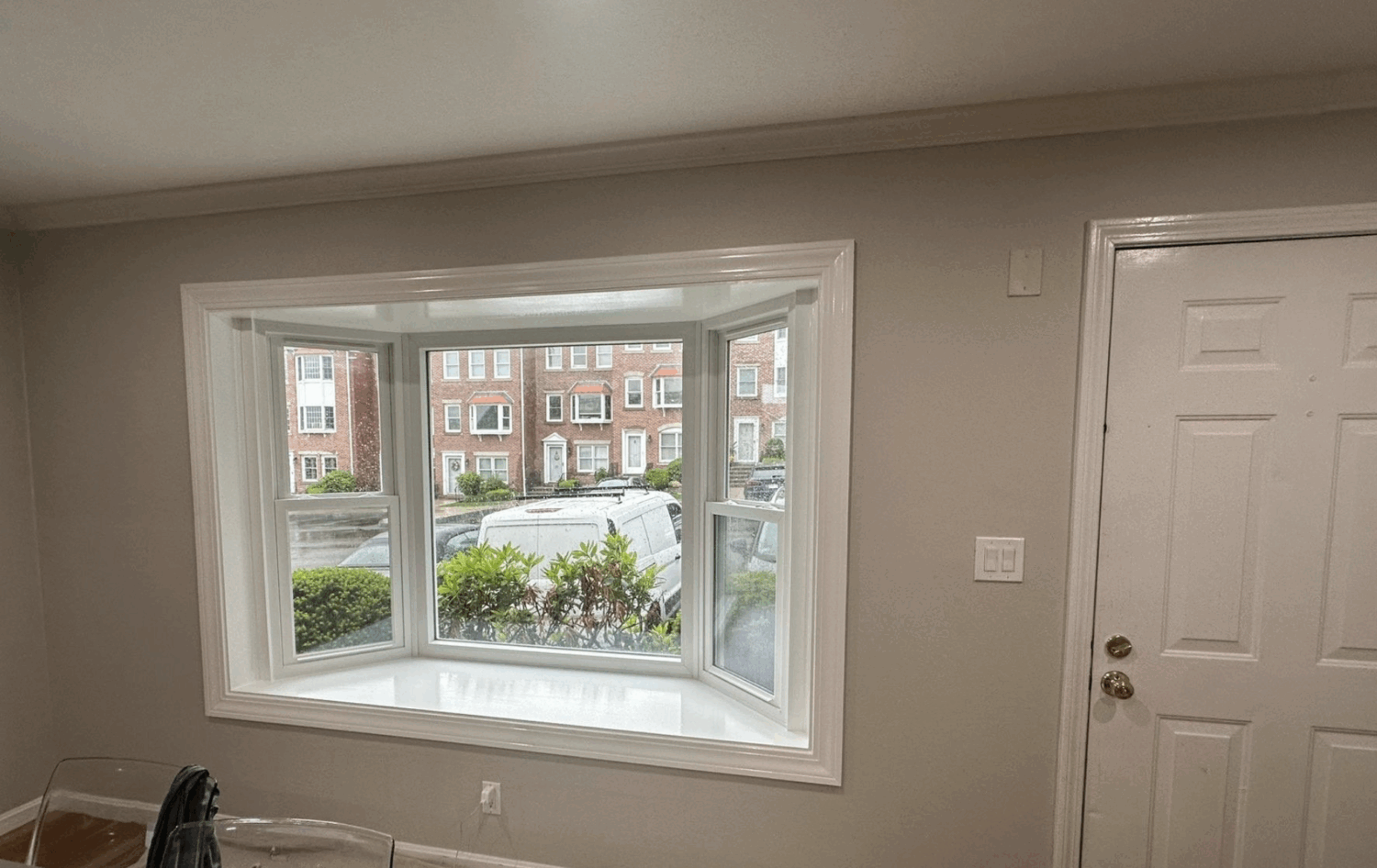 Interior view of bay window in Chelsea MA home after replace your windows project. Harvey Tribute Windows