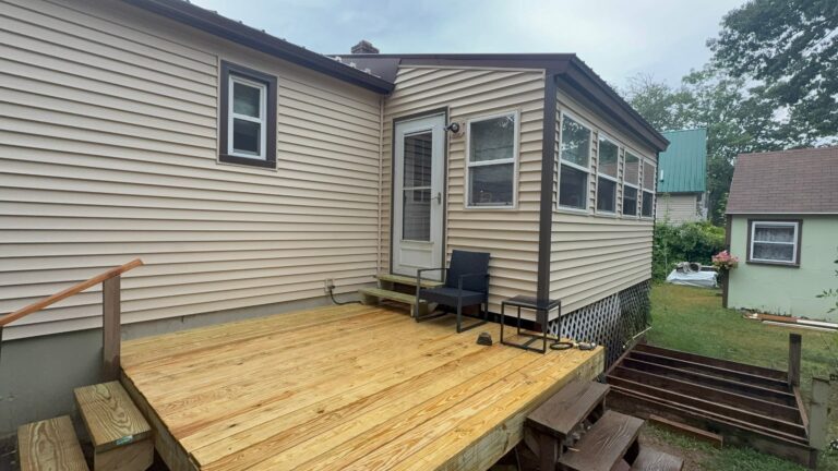 Professional vinyl siding installation completed on Laconia NH, Central NH, Belknap County home by Coastal Windows & Exteriors