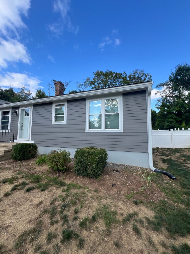 Professional window installation completed on Laconia NH, Central NH, Belknap County home by Coastal Windows & Exteriors. window contractors near me, energy efficient windows, window installation, window replacement, window contractors.