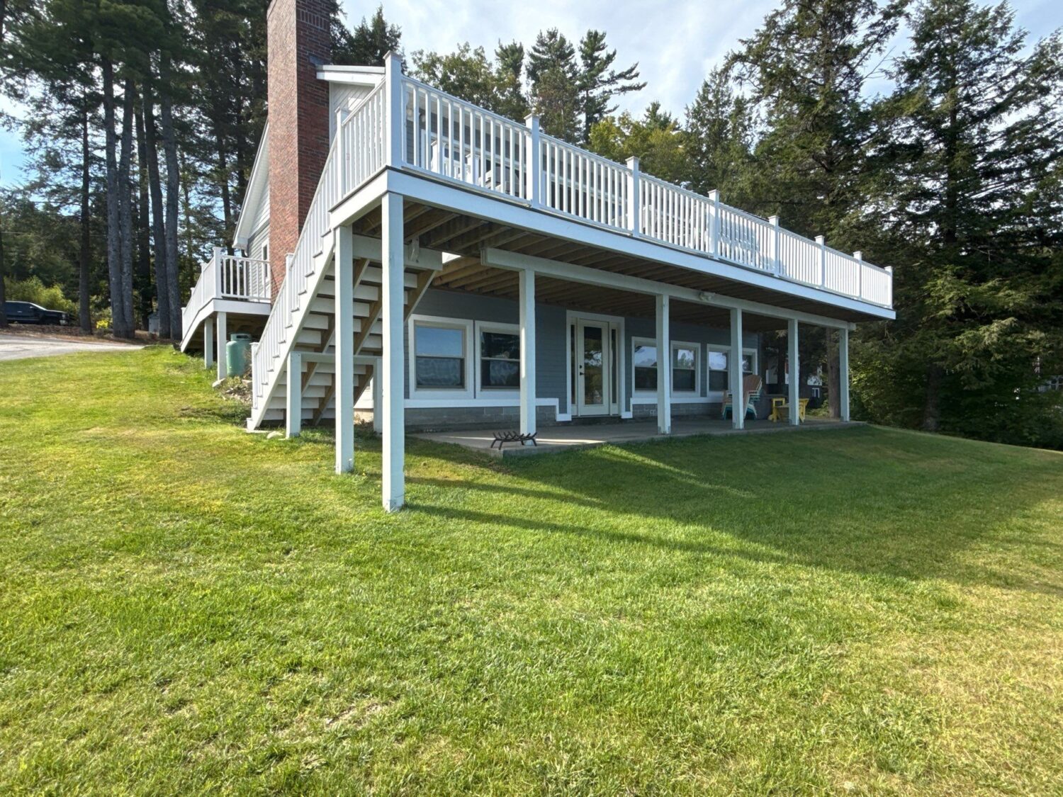 Expert front door replacement services demonstrated on Acton MA home by Coastal Windows & Exteriors