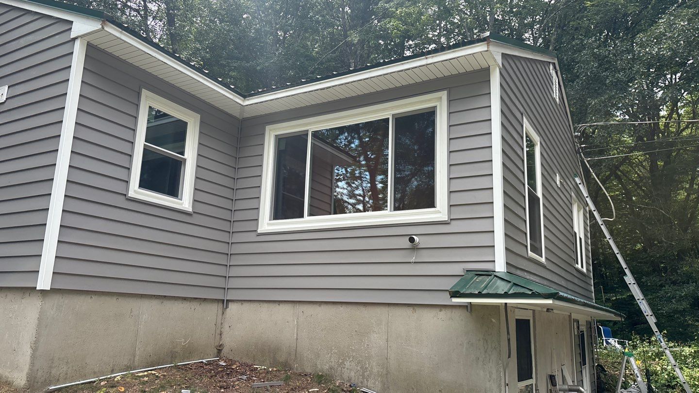 Professional vinyl siding installation in Barrington NH by Coastal Windows & Exteriors