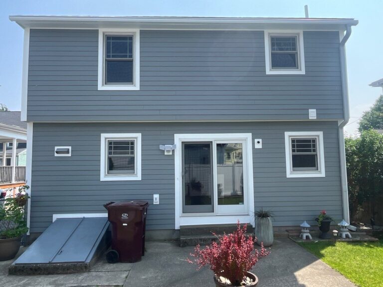 James Hardie siding installation addressing water damage in Everett MA, Greater Boston, Middlesex County home