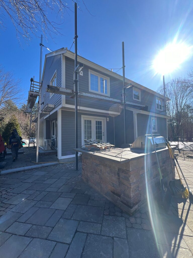Quality James Hardie siding project completed in Londonderry NH by Coastal Windows & Exteriors specialists