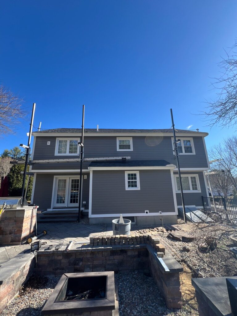 Expert James Hardie siding installation services demonstrated on Londonderry NH home by Coastal Windows & Exteriors