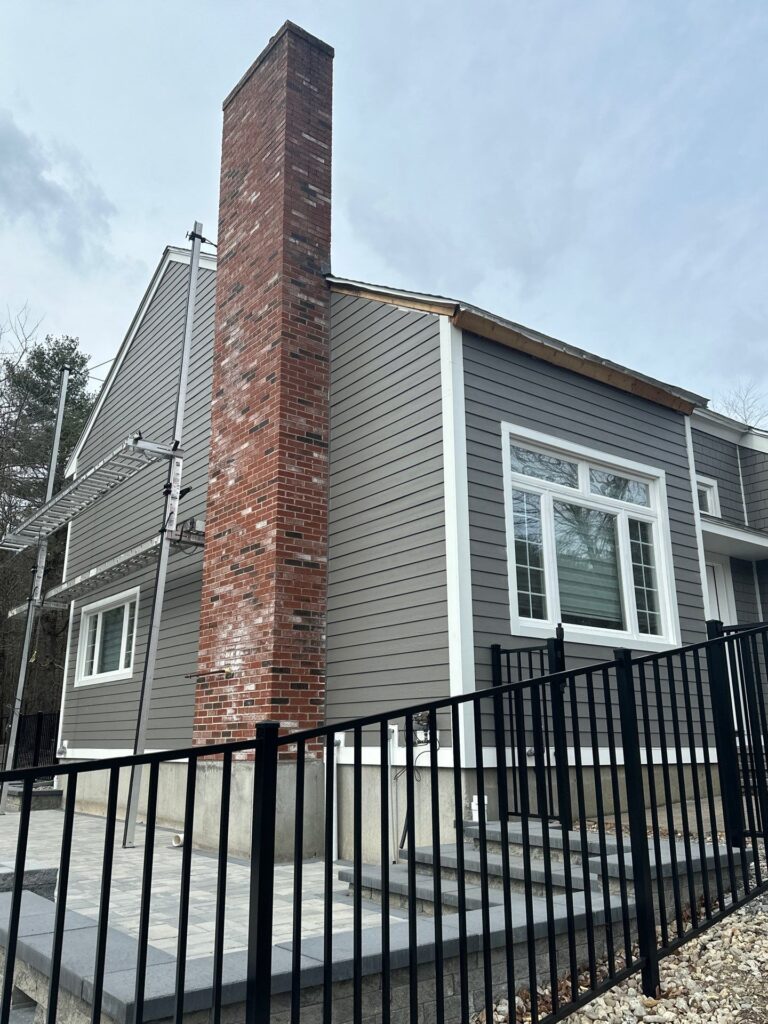 Complete James Hardie siding transformation in Londonderry NH by Coastal Windows & Exteriors professionals